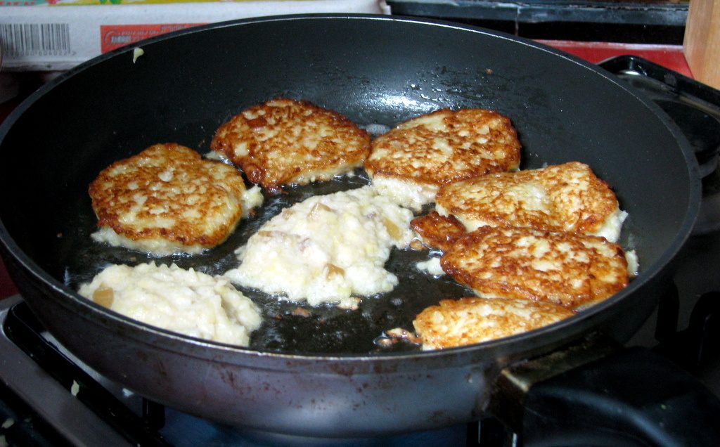 try Corn Latkes instead of these Potato Latkes Frying in Oil