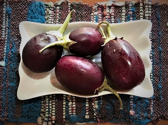 Oven roasting vegetables like baby eggplants in olive oil is a heart-healthy choice